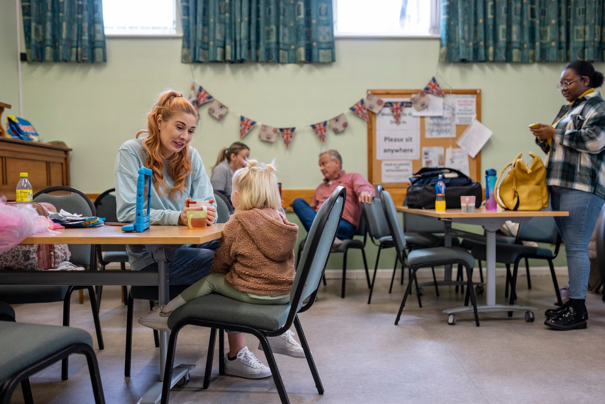 Parent and child in a welcoming community support space
